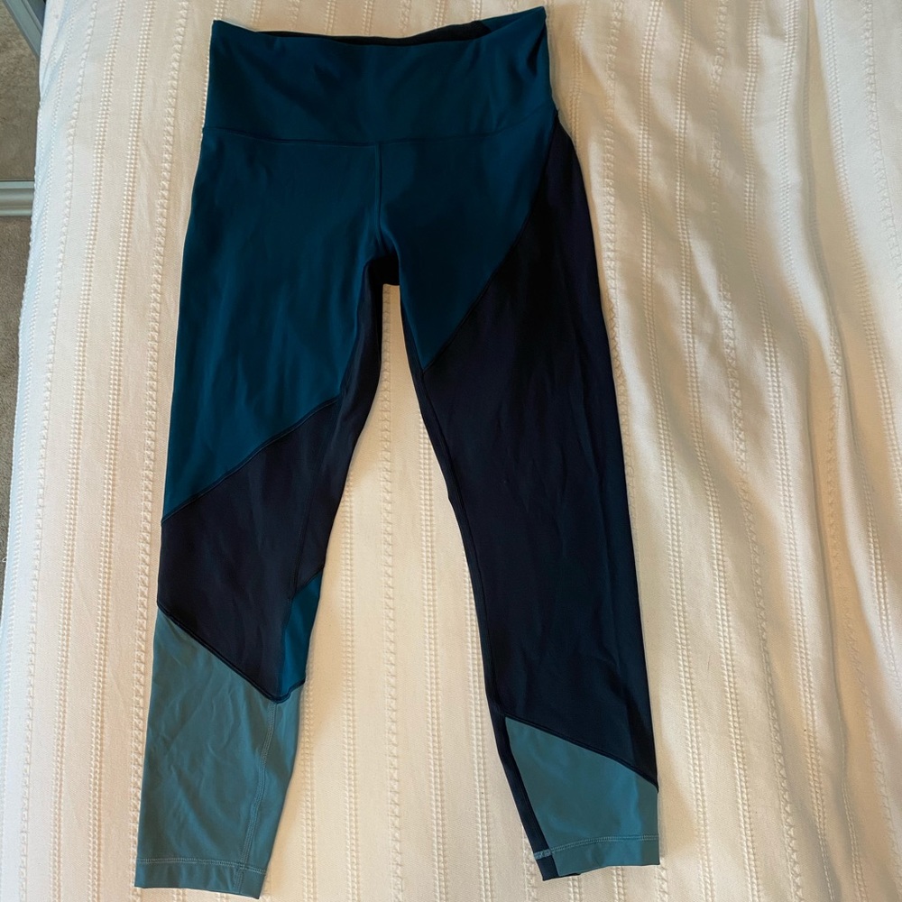 Lulu lemon size 10 navy/blue asymmetrical leggings